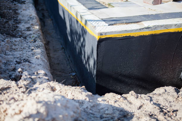 Professional Waterproofing technician working in Linden, AL